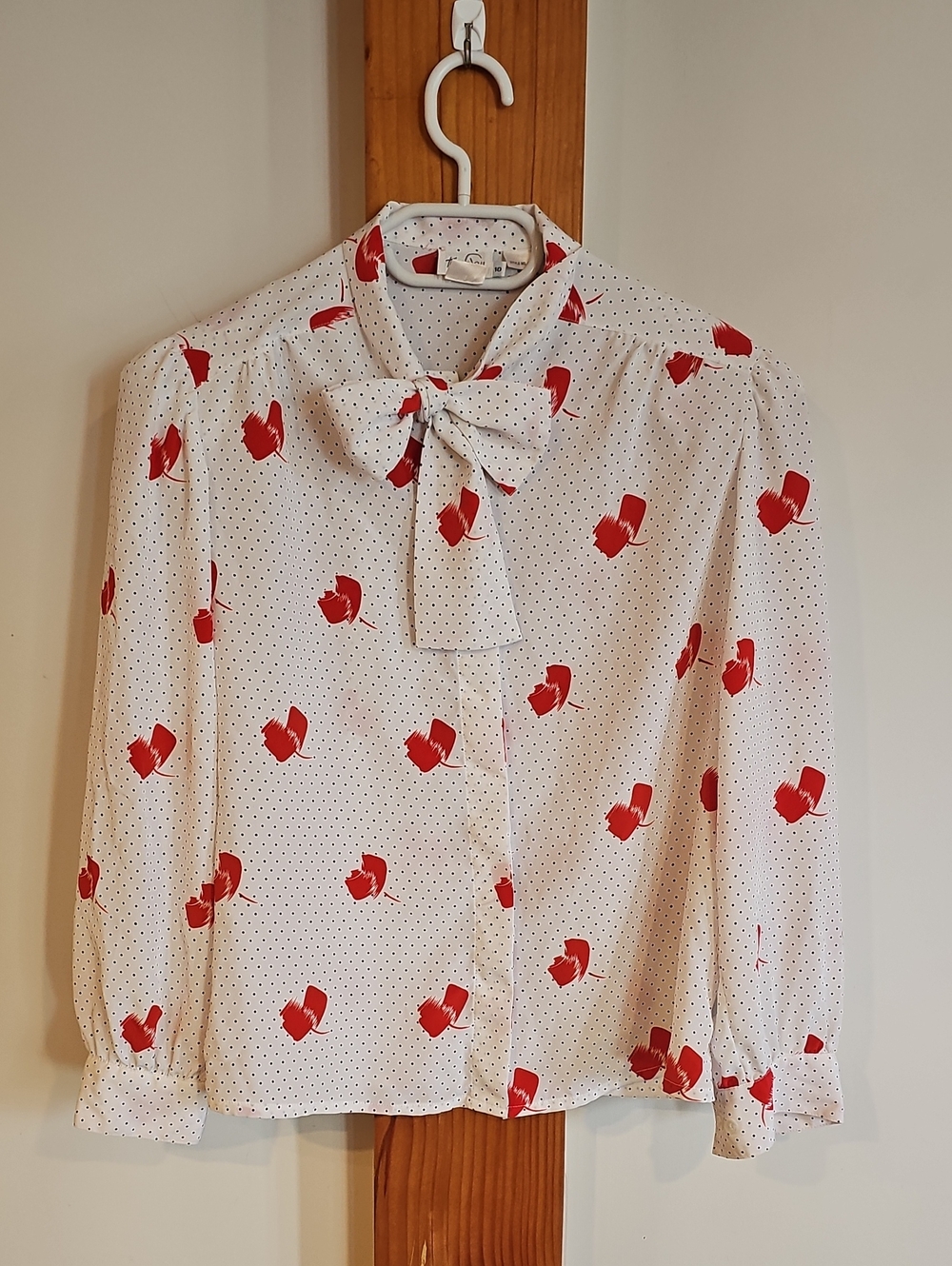 Vintage White Polka Dot Tie-Neck Blouse with Red Floral Accents